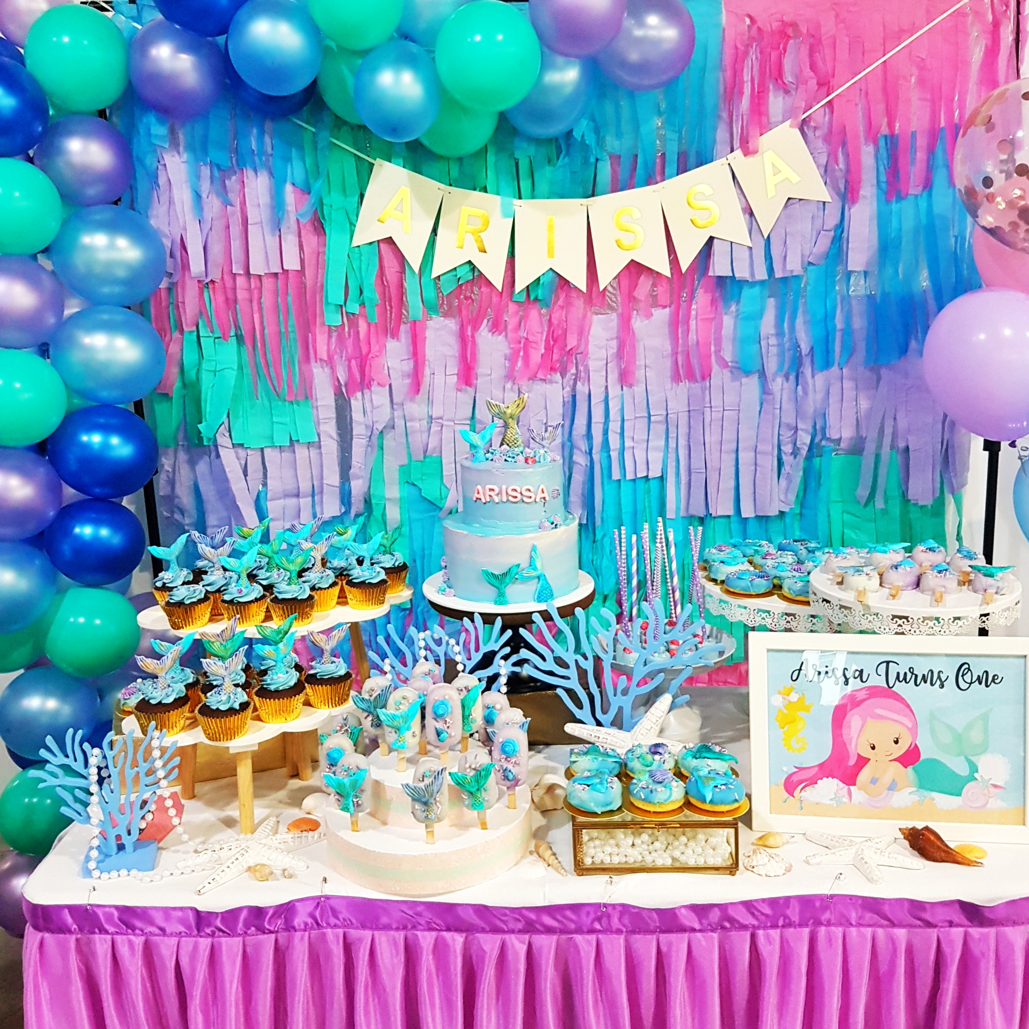 Mermaid dessert table by The Baking Experiment
